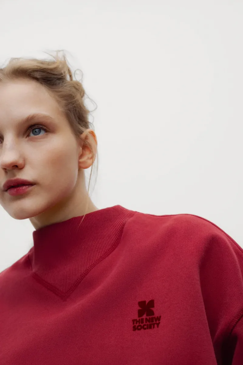 TNS logo rib collar sweatshirt rumba red